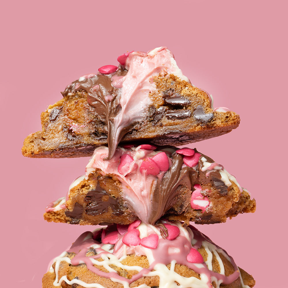 Stacked NYC Nutella cookies with Nutella centre, pink white chocolate drizzle and floral sprinkles — Mother's Day present